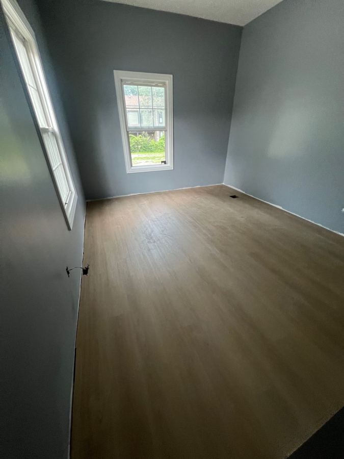 Bedroom: warm brown plank